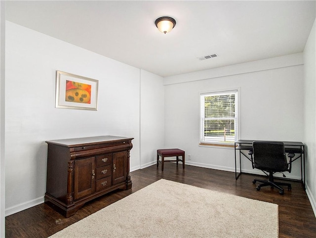 office space featuring dark hardwood / wood-style flooring