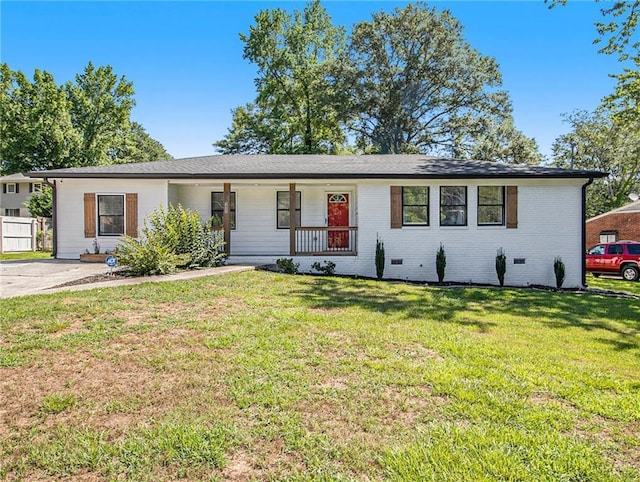 ranch-style home with a porch and a front yard