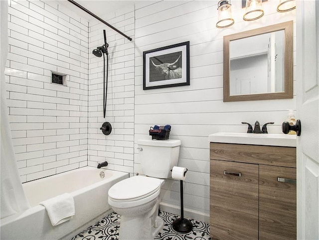 full bathroom with tile patterned flooring, shower / tub combo, vanity, and toilet