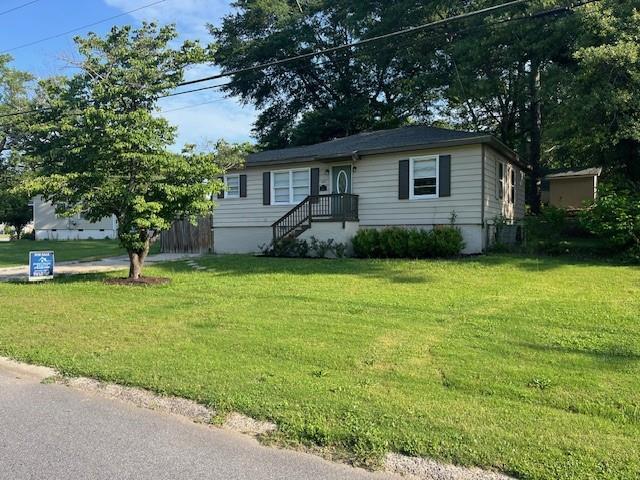 633 Tom Read Dr, Marietta, GA 30062 - ranch-style house featuring a front lawn