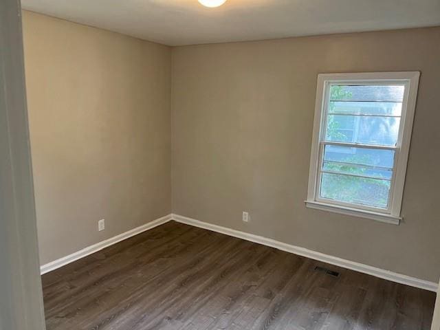 633 Tom Read Dr, Marietta, GA 30062 - unfurnished room featuring dark wood-type flooring and baseboards