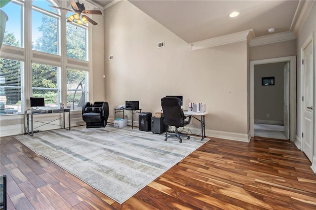 office area with ceiling fan, baseboards, wood finished floors, and ornamental molding