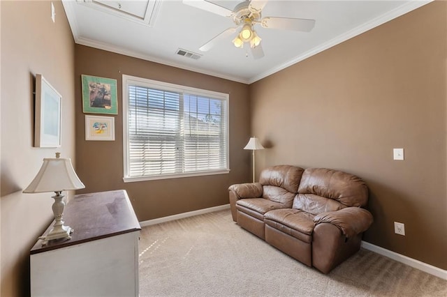 living room with visible vents, ornamental molding, carpet flooring, baseboards, and attic access