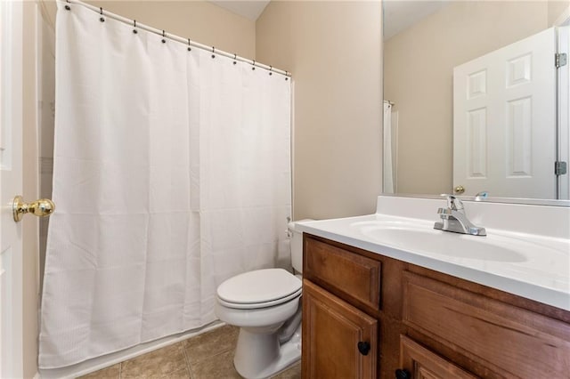 full bathroom featuring vanity, tile patterned floors, toilet, and a shower with shower curtain