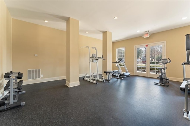 exercise room featuring recessed lighting, baseboards, visible vents, and french doors