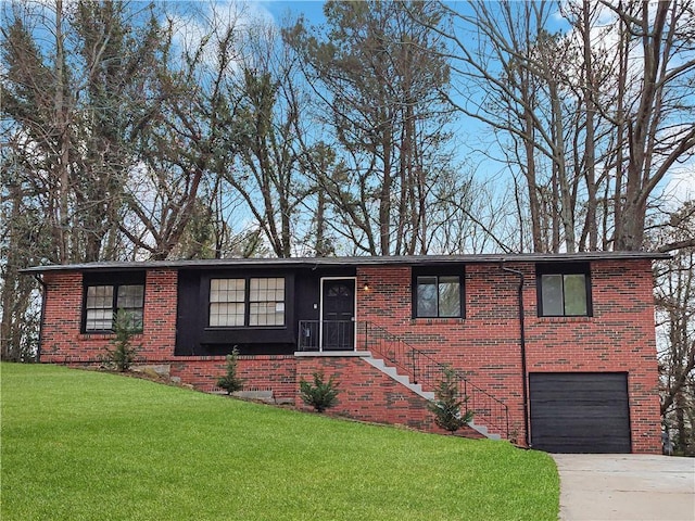 ranch-style house featuring a garage, driveway, a front lawn, and brick siding