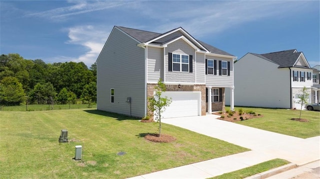 view of front of property with a garage and a front lawn