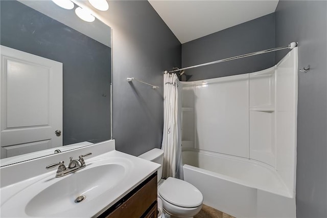 full bathroom featuring vanity, toilet, and shower / tub combo