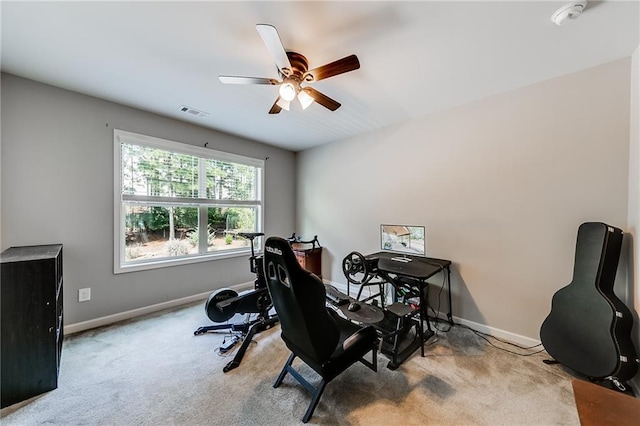 office featuring light colored carpet and ceiling fan