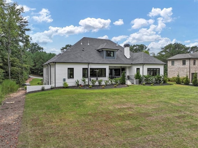 exterior space with a front lawn and covered porch