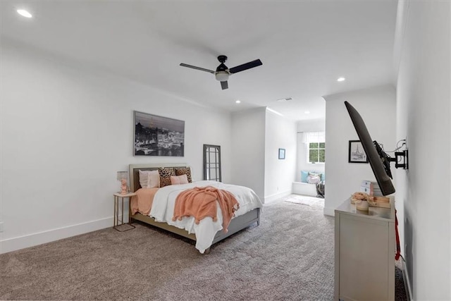 carpeted bedroom featuring ceiling fan