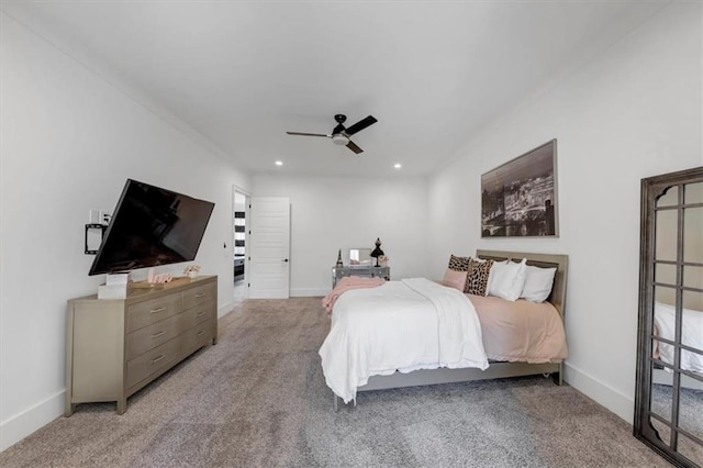 carpeted bedroom featuring ceiling fan