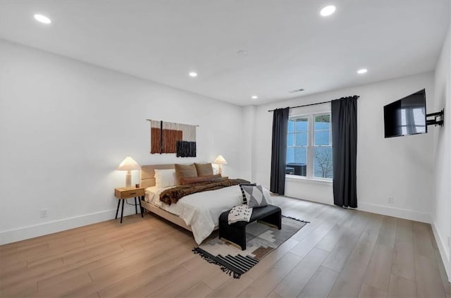 bedroom featuring light wood-type flooring