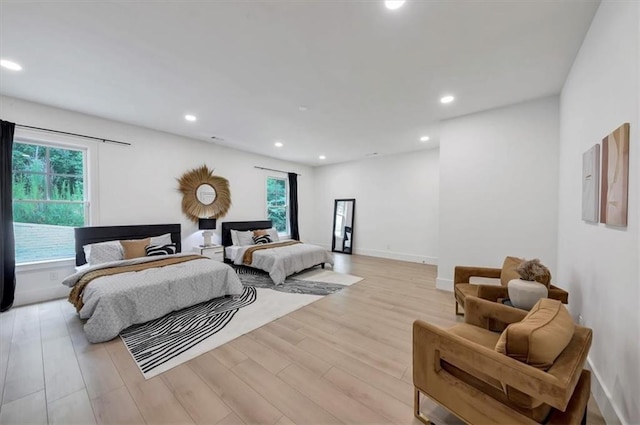 bedroom with light wood-type flooring