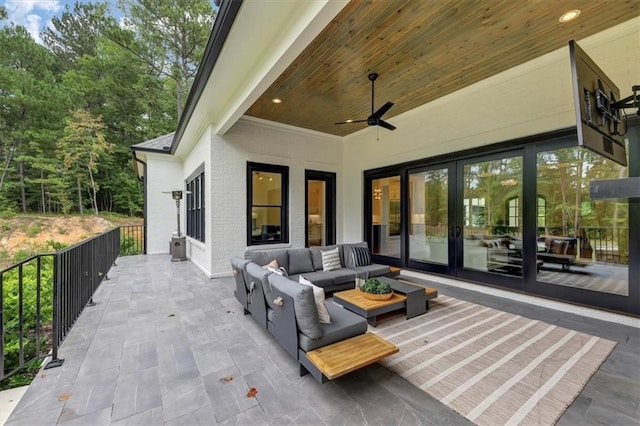 view of patio / terrace with ceiling fan and an outdoor hangout area