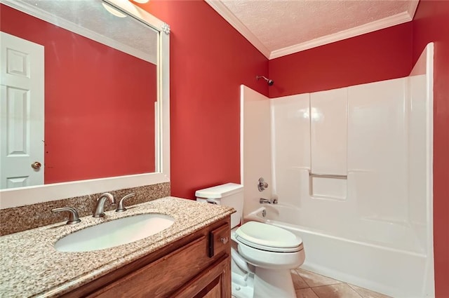 full bathroom with tile patterned floors, toilet, a textured ceiling, crown molding, and vanity