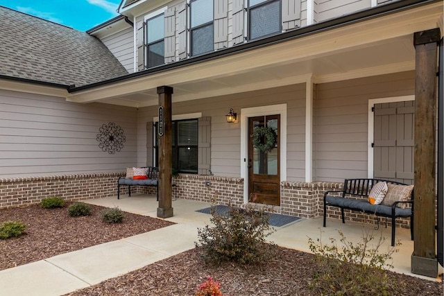 entrance to property with covered porch