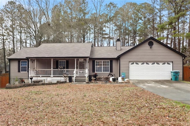 ranch-style house with a garage, a front lawn, and a porch