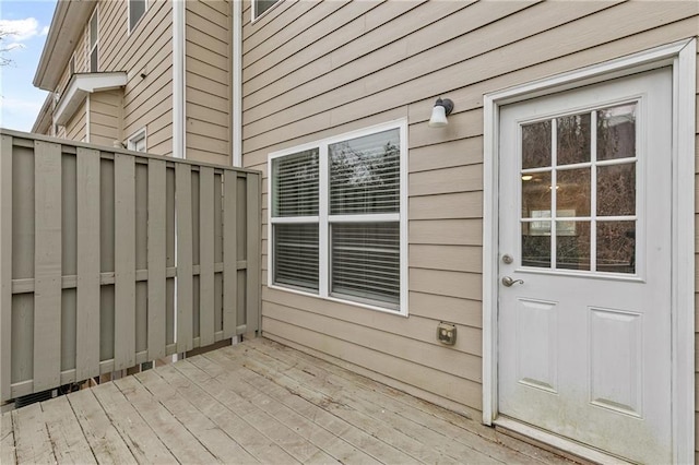 back of property featuring central AC, a wooden deck, and stairs