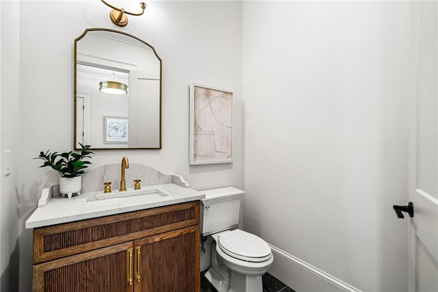 605 Claxton Ln, Milton, GA 30004 - half bath featuring baseboards, toilet, and vanity