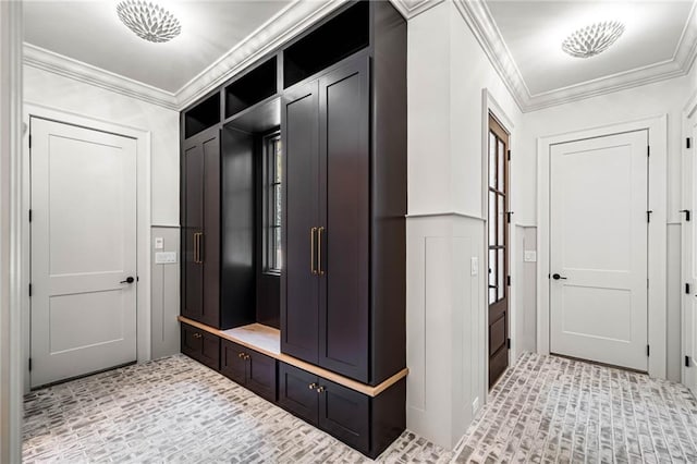 605 Claxton Ln, Milton, GA 30004 - mudroom with brick floor, crown molding, and wainscoting