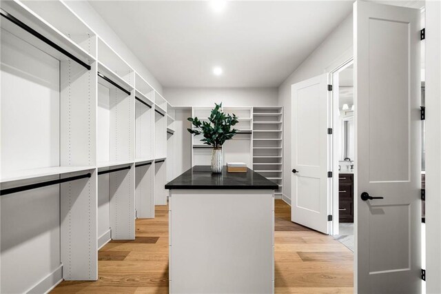 spare room with high vaulted ceiling, wood ceiling, and hardwood / wood-style flooring