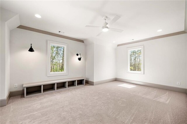 bathroom with crown molding, a shower with shower door, and vanity