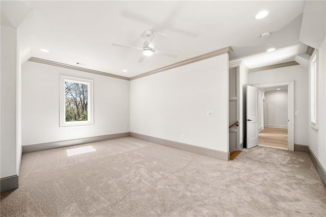 605 Claxton Ln, Milton, GA 30004 - unfurnished room with light colored carpet, crown molding, ceiling fan, and baseboards