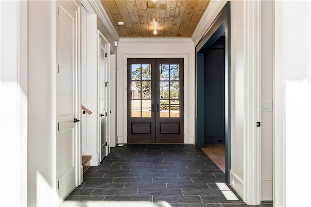 doorway featuring wooden ceiling, crown molding, and french doors