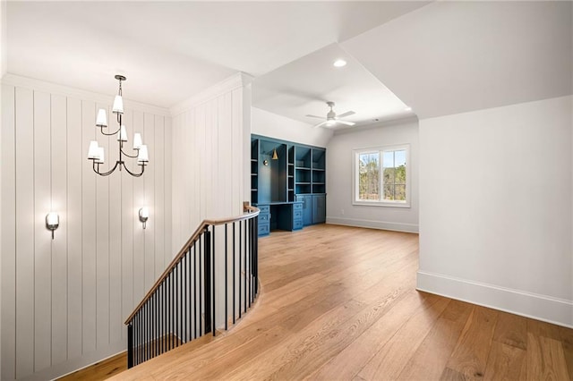 605 Claxton Ln, Milton, GA 30004 - hall featuring an upstairs landing, baseboards, wood finished floors, recessed lighting, and an inviting chandelier