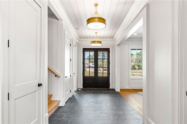 605 Claxton Ln, Milton, GA 30004 - entrance foyer with stairway, french doors, ornamental molding, dark wood-type flooring, and baseboards