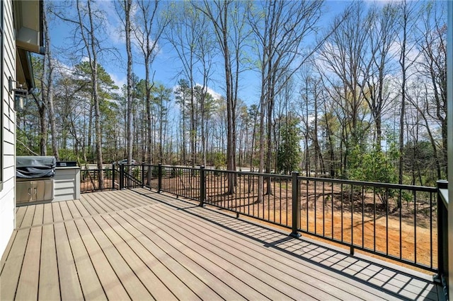 605 Claxton Ln, Milton, GA 30004 - wooden terrace with grilling area