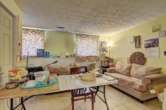 3576 Shrewsbury Ct, Snellville, GA 30039 - tiled living area featuring a textured ceiling and visible vents