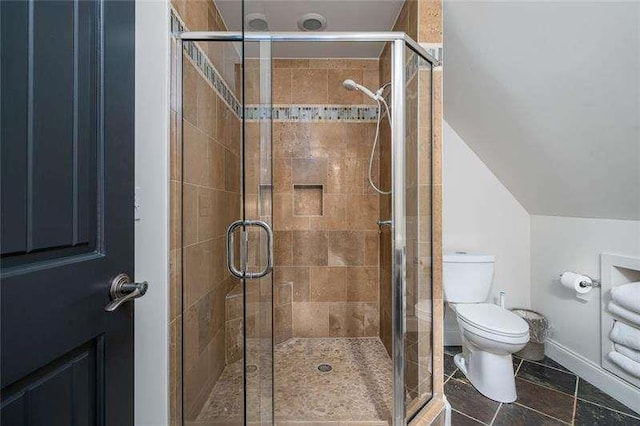 1363 Foxhound Trl, Ranger, GA 30734 - bathroom featuring a stall shower, lofted ceiling, and tile patterned flooring