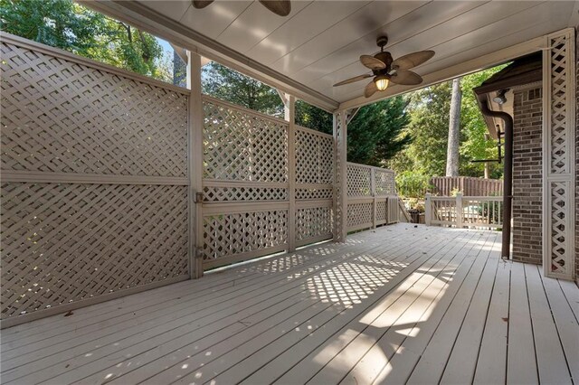 wooden deck with ceiling fan