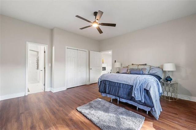 bedroom with a closet, ceiling fan, baseboards, wood finished floors, and ensuite bathroom