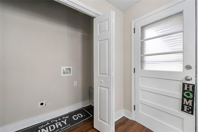 laundry area with dark wood-style floors, hookup for an electric dryer, laundry area, hookup for a washing machine, and baseboards