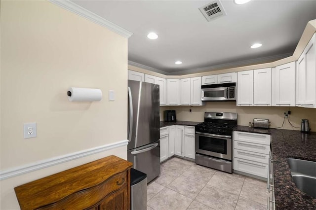 kitchen featuring light tile patterned floors, visible vents, appliances with stainless steel finishes, crown molding, and recessed lighting