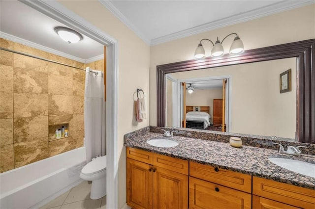 ensuite bathroom with crown molding, a sink, and toilet