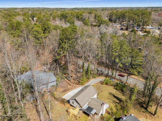 drone / aerial view with a view of trees