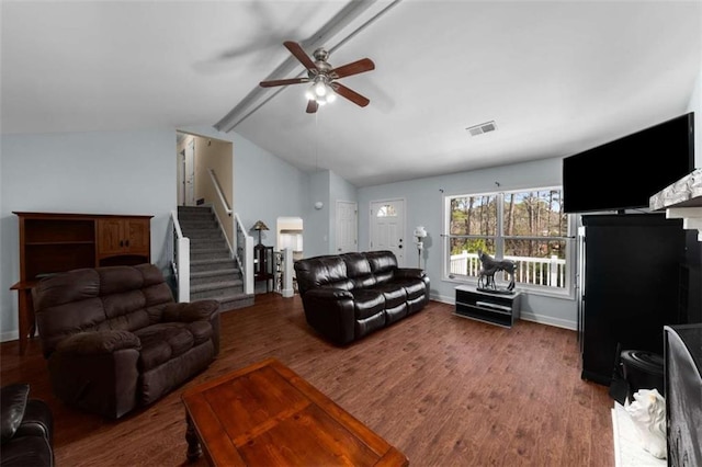 living area featuring visible vents, lofted ceiling with beams, wood finished floors, baseboards, and stairs