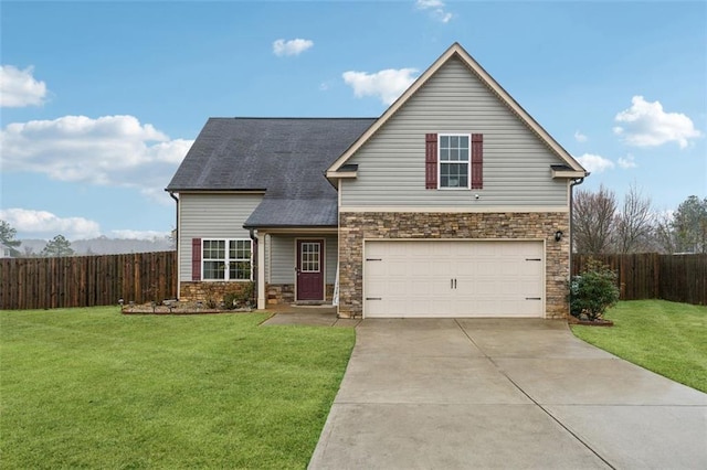 view of front property with a garage and a front lawn