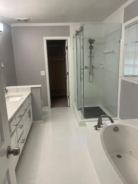 full bathroom featuring visible vents, vanity, tile patterned flooring, a whirlpool tub, and a shower stall