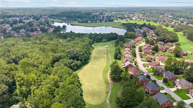 bird's eye view featuring golf course view, a water view, and a residential view