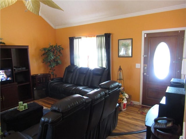 274 Griffith St, Winder, GA 30680 - living area with vaulted ceiling, wood finished floors, crown molding, and ceiling fan