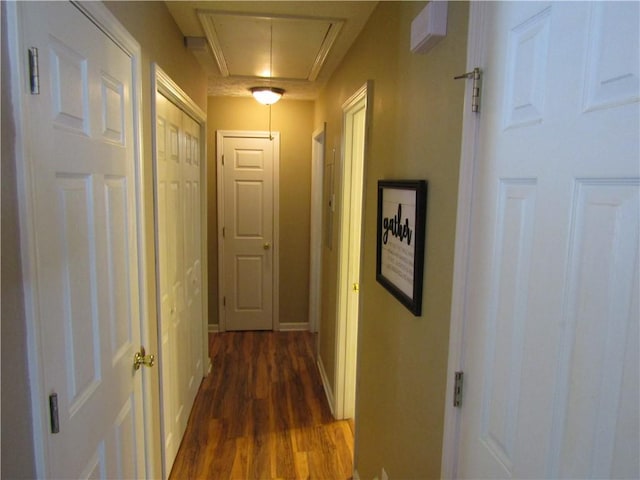 274 Griffith St, Winder, GA 30680 - hallway featuring attic access, dark wood finished floors, and baseboards