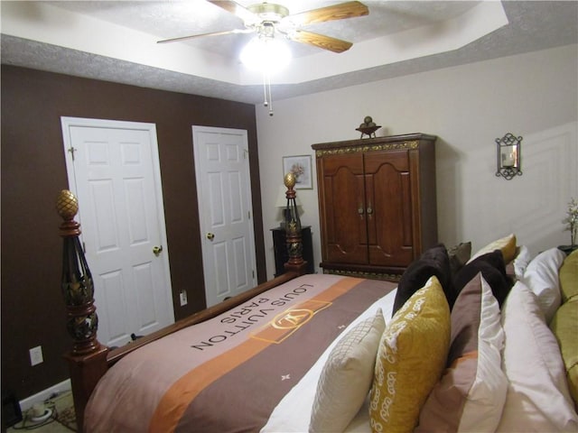 274 Griffith St, Winder, GA 30680 - bedroom with a raised ceiling and ceiling fan