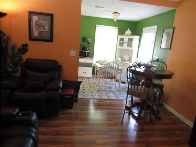 274 Griffith St, Winder, GA 30680 - living area featuring wood finished floors and baseboards