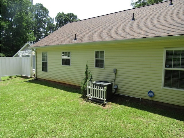 274 Griffith St, Winder, GA 30680 - rear view of house with central AC unit and roof with shingles