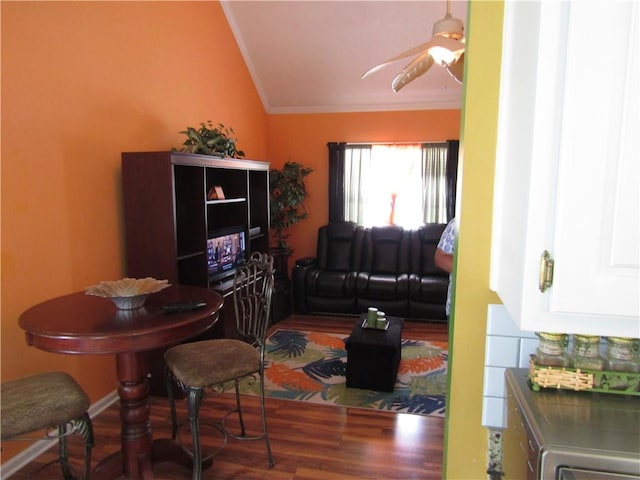 274 Griffith St, Winder, GA 30680 - living area with wood finished floors, ornamental molding, lofted ceiling, and ceiling fan